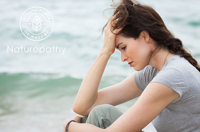 woman depressed at the beach-eyecatch